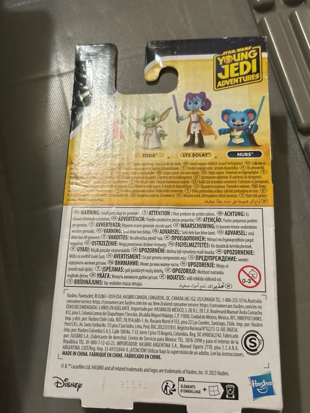 Hasbro Blue Nubi Figure with Cream Outfit and Green Belt